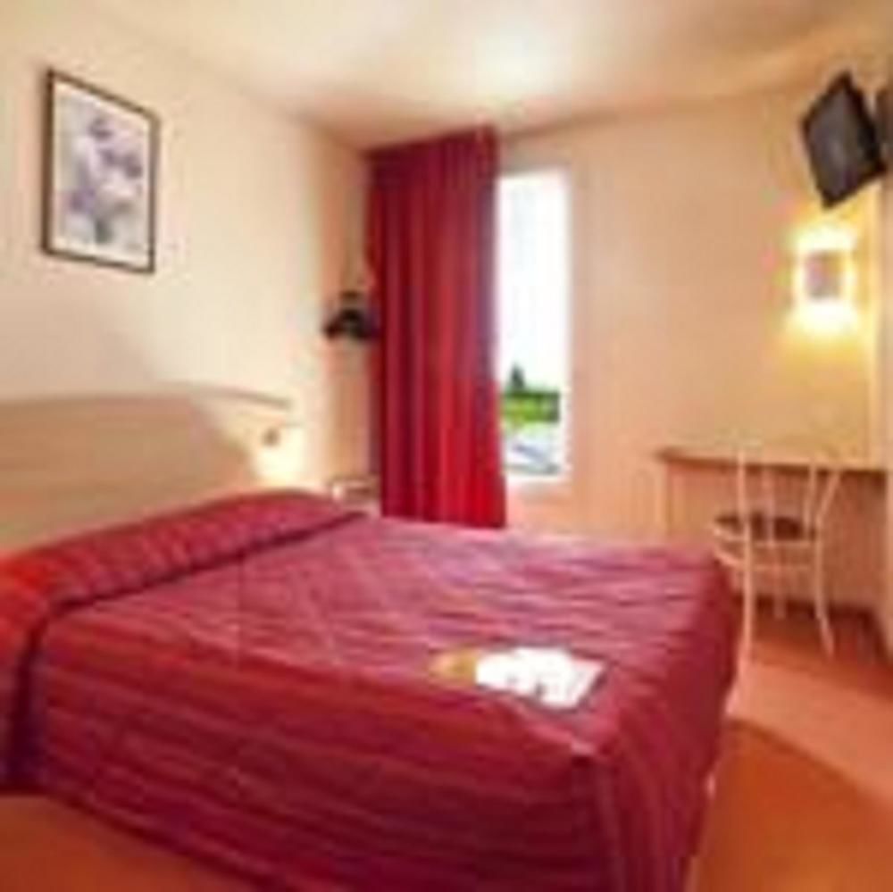 프리미어 클래스 에브루 호텔 에브뢰 외부 사진 A typical room at a hotel
